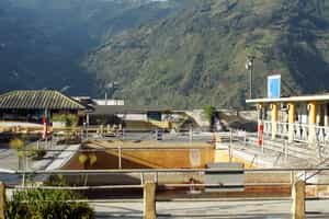 Soak in the natural hot baths of Baños